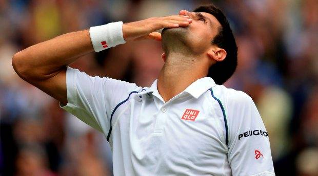 Novak Djokovic celebrates winning the Men's Single's Final during day Thirteen of the Wimbledon Championships