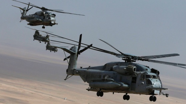 Eight Afghan soldiers have been killed after US helicopters under attack mistakenly returned fire in their direction