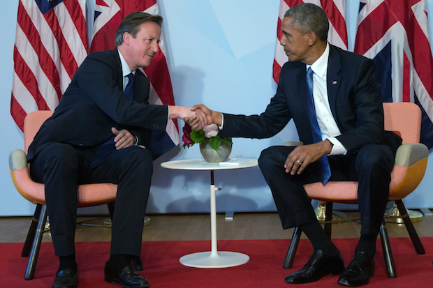 Barack Obama and David Cameron shake hands during a bilateral meeting at the summit of G7 nations at Schloss Elmau