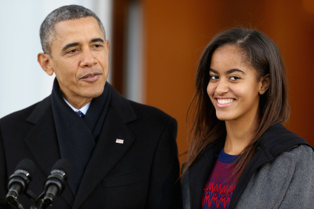 WASHINGTON DC- NOVEMBER 27  U.S. President Barack Obama delivers remarks with his daughter Malia Obama 15 before pardoning the 2013 National Thanksgiving Turkey'Popcorn on the North Portico of the White House