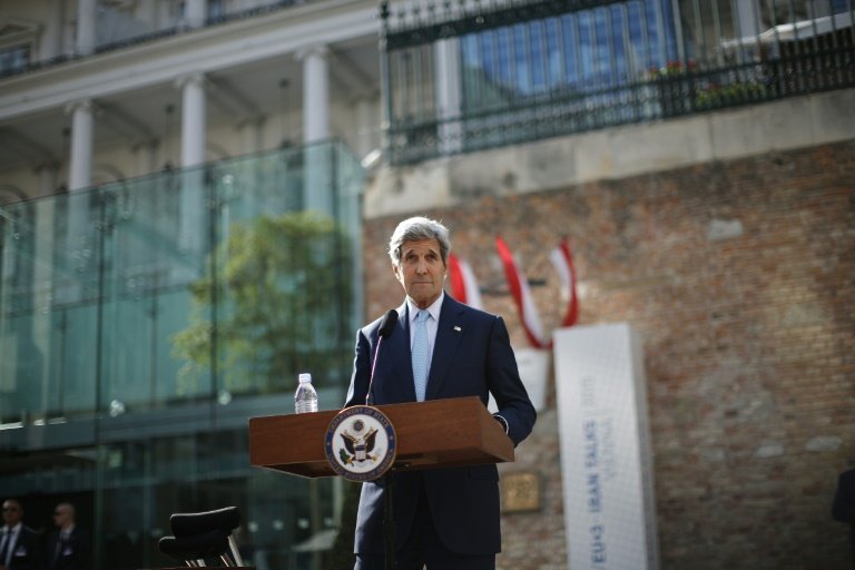 US Secretary of State John Kerry pauses as he listens to a question from a journalist after delivering a statement on the Iran talks in Vienna