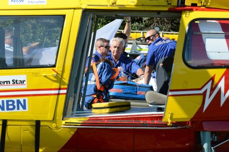 Paramedics work on a 32 year old Ballina man who was attacked by a shark at Lighthouse Beach Ballina on Thursday morning