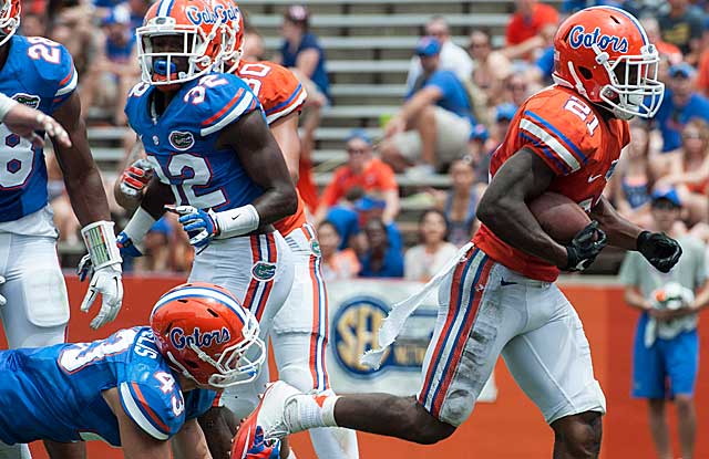 Phil Sandlin  Associated Press
        Kelvin Taylor reached paydirt in Florida's Orange Blue spring game