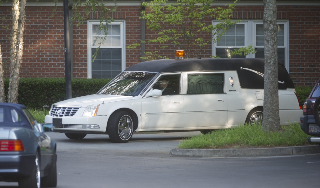 A hearse leaves the hospice which Bobby Kristina Brown is checked into in Duluth Ga., Thursday