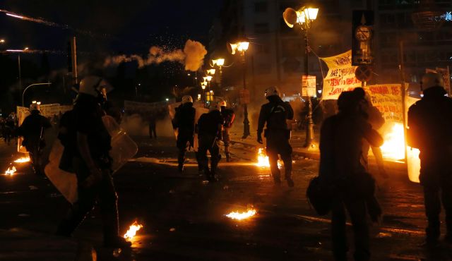 Police and protesters clash in Athens Greece