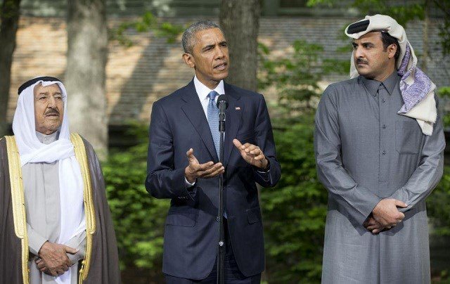 President Barack Obama center with Kuwaiti Emir Sheikh Sabah Al-Ahmad