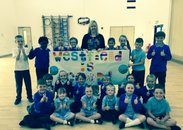 Westfield Primary Academy pupils share the joy of its being rated a'Good school by Ofsted inspectors with head teacher Nicky Tyler ANL-150807-101835001