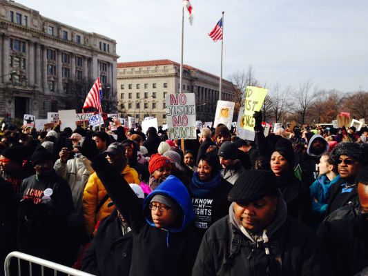 Thousands of people including Garner's family marched