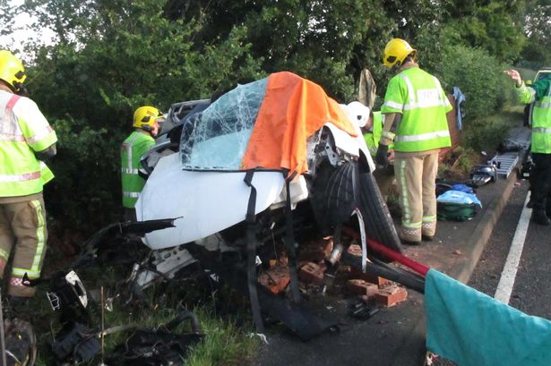 Rescuers save a driver from a car in danger of falling 20ft into Midland river