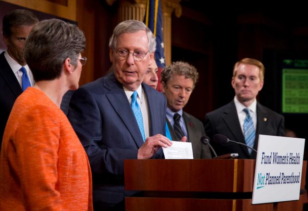 Senate Majority Leader Mitch Mc Connell of Ky. joined by from left Sen. John Thune R-S.D. Sen. Joni Ernst R-Iowa Republican presidential candidate Sen. Rand Paul R-Ky. and Sen. James Lankford R-Okla. speaks during a news conference on Capitol H