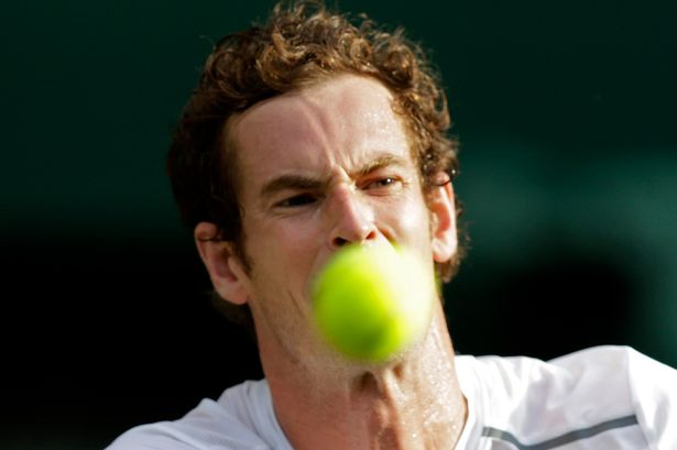 Andy Murray of Britain hits a shot