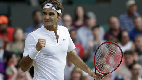 Roger Federer of Switzerland celebrates winning the singles match