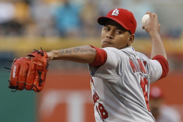 St. Louis Cardinals starting pitcher Carlos Martinez throws