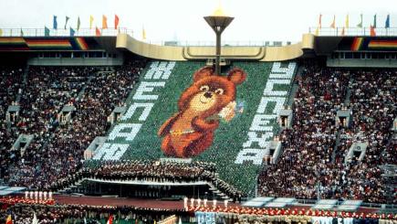 A wall of cards displays the Games&#39 mascot Misha the Bear at the Opening Ceremony at the Lenin Stadium Moscow