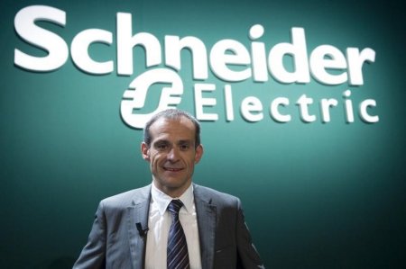 Jean-Pascal Tricoire CEO of French engineering group Schneider Electric poses for the media before the company's shareholder's meeting in La Defense near Paris