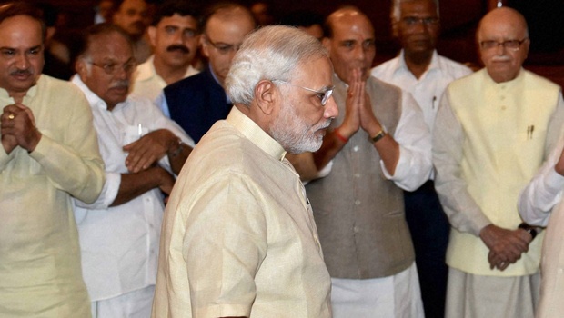 Prime Minister Narendra Modi arrives to pay tributes to Lokmanya Bal Gangadhar Tilak on his birth anniversary at Parliament in New Delhi on Thursday