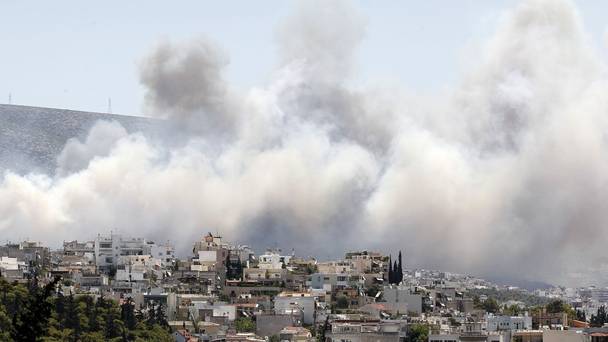 Smoke from a fire over the eastern suburbs of Athens