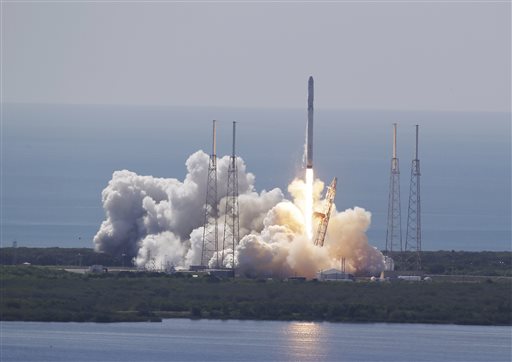 The SpaceX Falcon 9 rocket and Dragon spacecraft lifts off from Space Launch Complex 40 at the Cape Canaveral Air Force Station in Cape Canaveral Fla. Sunday