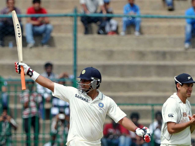 Suresh Raina acknowledges the crowd after reaching his fifty vs New Zealand in 2012