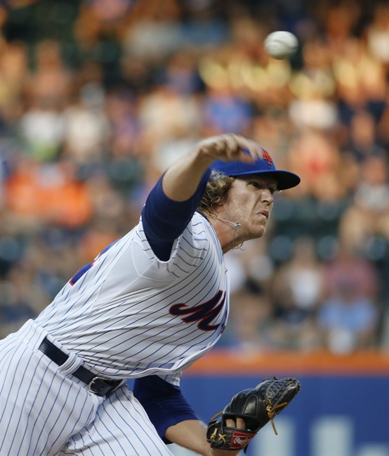 New York Mets starting pitcher Noah Syndergaard delivers in the first inning of a baseball game against the San Diego Padres Tuesday