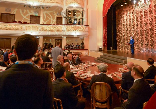 Russian President Vladimir Putin right speaks at a reception in honour of the participants in the BRICS and SCO Summits in Ufa Russia Thursday