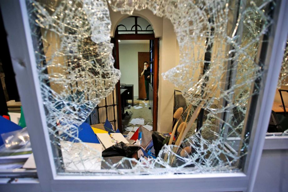 A group of protesters stormed the consulate overnight smashing windows and breaking in to the offices where they destroyed