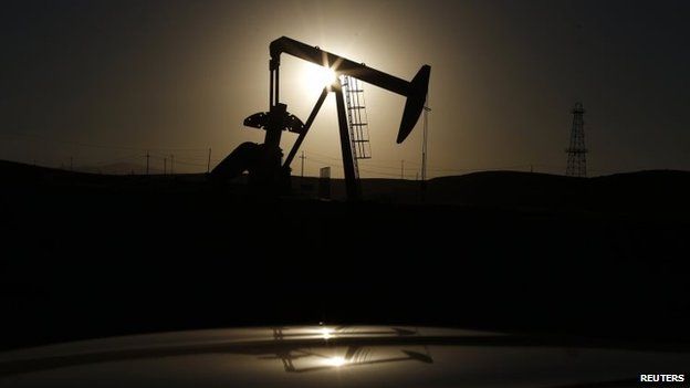 A pump jack is seen at sunrise near Bakersfield California