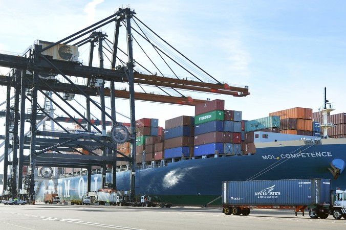 The MOL Competence a 1,036-foot-long 150-foot-wide container ship carrying 45,000 tons of cargo is moored at the Tra Pac Container Terminal in Jacksonville Fla. on Jan. 6 2015. The Commerce Department reported on the U.S. trade gap for May 2015 on Ju