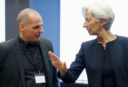 Greek Finance Minister Yanis Varoufakis listens to International Monetary Fund Managing Director Christine Lagarde during an euro zone finance ministers meeting in Luxembourg