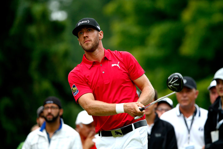 Graham De Laet tees off on the third hole during the final round of the RBC Canadian Open at the Royal Montreal Golf Club