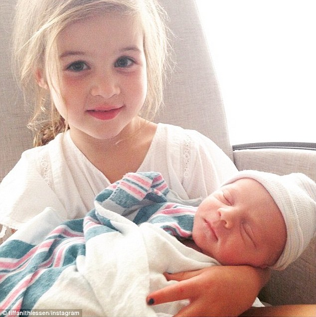 Proud mom Tiffani Thiessen introduced fans to her new son Holt Fisher Smith with a sweet