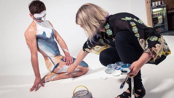 Olympic diver Tom Daley swapping his swimming shorts for shark skin-style body paint to raise awareness of the important role sharks play in the ecosystem