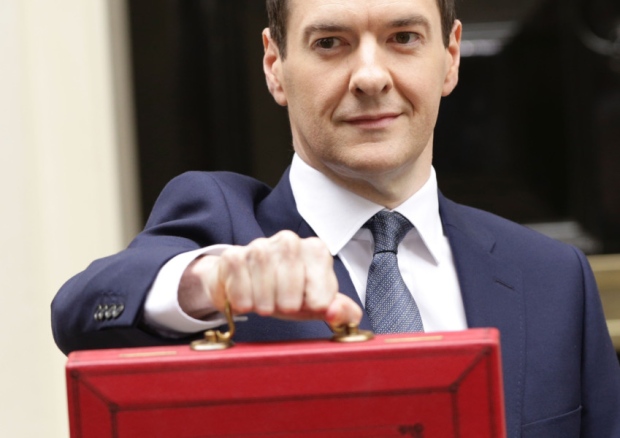 Chancellor of the Exchequer George Osborne outside 11 Downing Street London before heading to the House of Commons to deliver his first Tory-only Budget