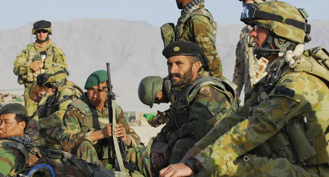 Afghan officials say 14 soldiers killed in US air strike