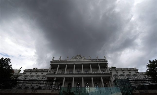 Dark clouds hang over Palais Coburg where closed-door nuclear talks with Iran take place in Vienna Austria Thursday