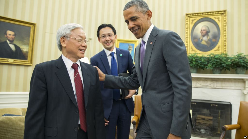 President Barack Obama right meets with Vietnamese Communist party secretary general Nguyen Phu Trong in the Oval Office of the White House on Tuesday