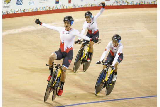 Canada's Laura Brown left Jasmin Glaesser centre and Kirsti Lay celebrate winning gold following the track cycling women's team pursuit finals at the Pan Am Games in Milton Ont. on Friday