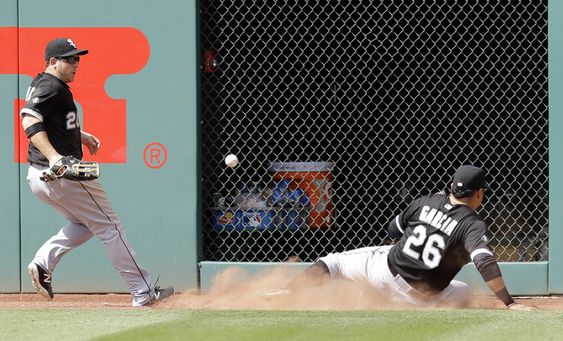 J.B. Shuck left and Avisail Garcia try to field a triple hit by Cleveland Indiansâ€™ Giovanny Urshela in the ninth inning of a baseball game Sunday