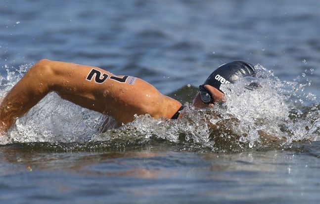 Hungary's Gergely Gyurtal competes in the men's 10km open water swim competition at the Swimming World Championships in Kazan Russia Monday