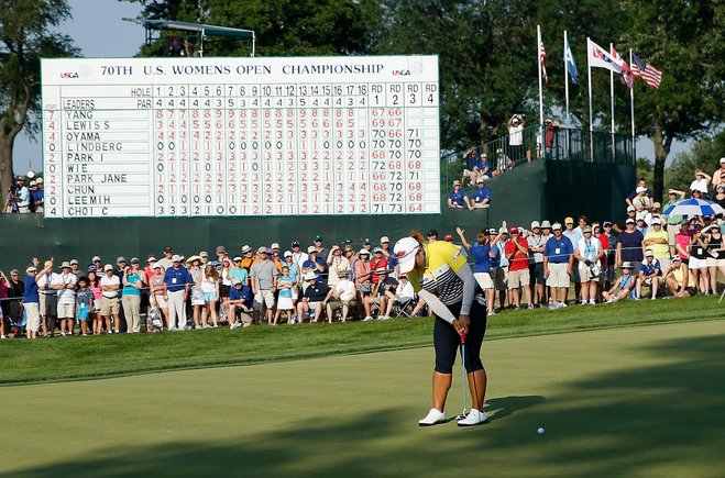 Amy Yang watches her birdie attempt on the 18th green at Lancaster Country Club on Saturday