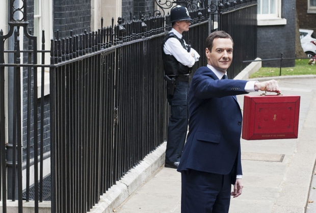 Chancellor of the Exchequer George Osborne outside 11 Downing Street before heading to the House of Commons to deliver his first Tory-only Budget