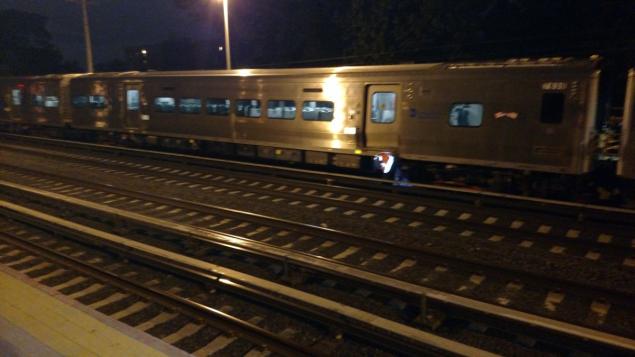 Police investigate after two people were fatally struck by a Long Island Railroad train at the Hollis Station near Woodhull Ave. and 193rd St. in Queens early Thursday