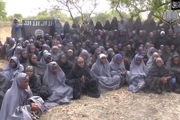 Kidnapped schoolgirls are seen at an unknown location