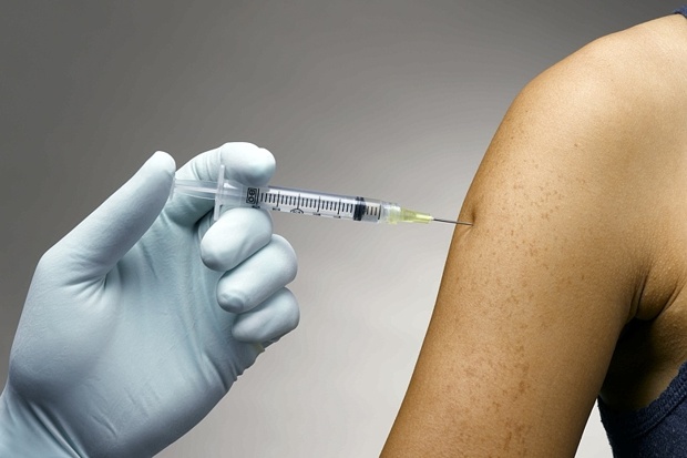 Person receiving a vaccine