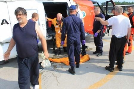 Coast Guard rescues 3 from sinking boat off Cape Cod