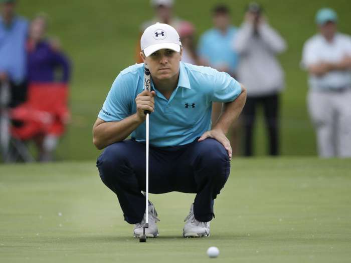 Jordan Spieth lines up a putt on the 11th hole during the first round of the Colonial golf tournament Thursday