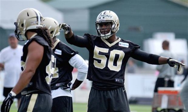 New Orleans Saints Stephone Anthony directs the defense at the teams NFL football training camp in White Sulphur Springs W. Va. Thursday