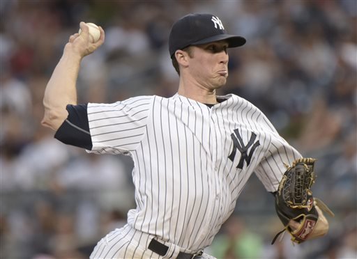 New York Yankees pitcher Bryan Mitchell delivers the ball to the Minnesota Twins during the first inning of a baseball game Monday Aug 17 2015 at Yankee Stadium in New York