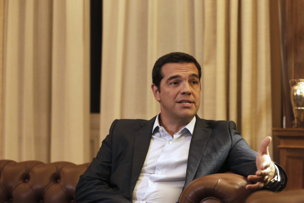 Greece's Tsipras resigns, calls snap polls to beat party revolt