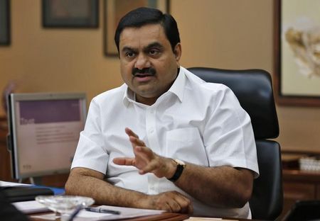 UK-INDIA-SOLAR-EXCLUSIVE:Exclusive- India s Adani in talks with Softbank Foxconn on $3 billion solar plan sources